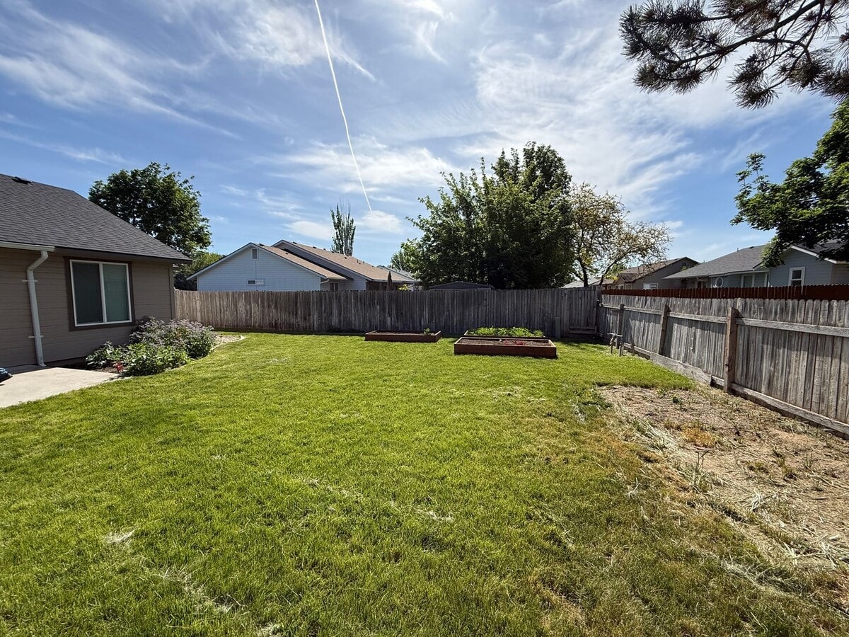 Photo - Updated 4-Bedroom Corner Lot Home with New Flooring, Carpet & Fresh Interior Paint