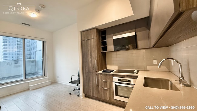 Building Photo - 2033 Kennedy Rd Unit 809-2033 Kennedy Rd, Scar