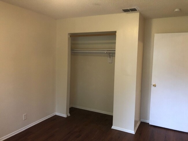 Photo - SPACIOUS 3BR/1.5BA w/Carport, Beautiful Wood Finish Flooring, Privacy Fenced Backyard! NO APP FEE!