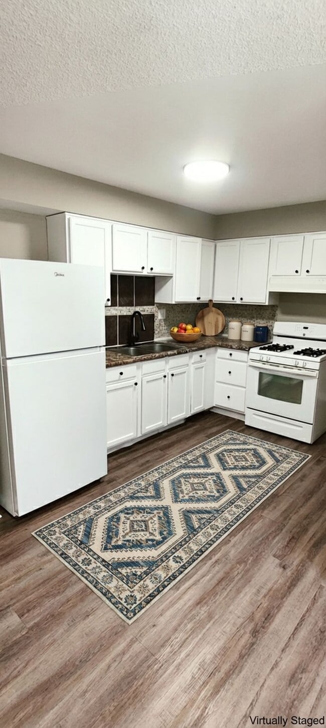 Photo - STERLING COURT APARTMENTS