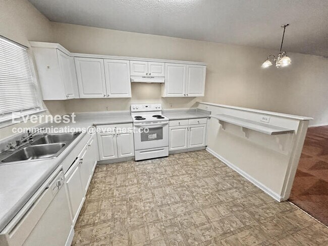 Photo - 3 Bed, 1.5 Bath Townhome with Fenced Yard / Pet-Friendly / Coming Soon!