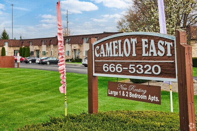 Camelot East Apartments sign