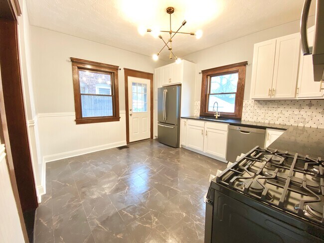 Slate GE appliances, new french door fridge, dishwasher and disposal and luxury vinyl tile flooring - 1346 Edwards Ave