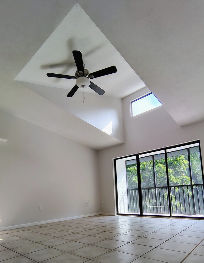 Vaulted ceiling over DR and LR w/view of balcony and preserve - 1353 Pine Ridge Cir E Unit 128 E3