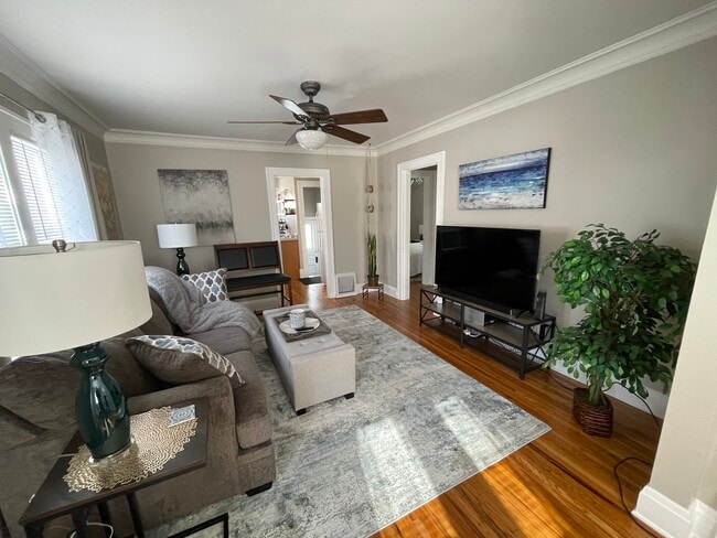 Looking back through living room into kitchen - 514 Center St House