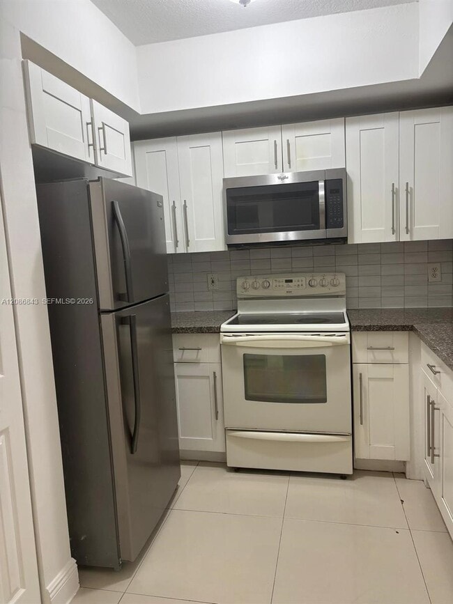 Building Photo - 11060 SW 196th St Unit 108