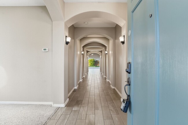 Photo - Stunning 4-Bed + Den Eastmark Home with Modern Upgrades Throughout