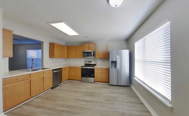 Photo - Contemporary 4-Bedroom Gem with Open-Plan Design