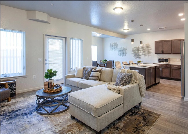 3BR, 2BA - 1356SF - Living - The Residence at Corbin Crossing