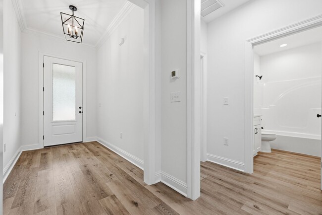 Photo - Brand New All-Brick 3-Bedroom 2-Bath Home in Villa Tasso!