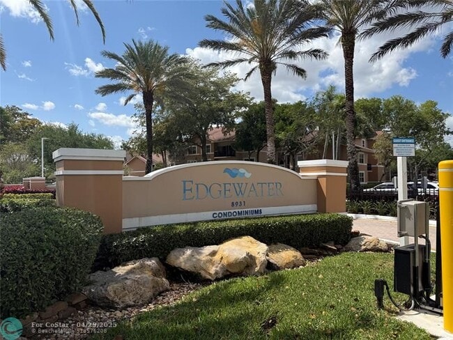 Photo - 9033 Wiles Rd Condo Unit 304