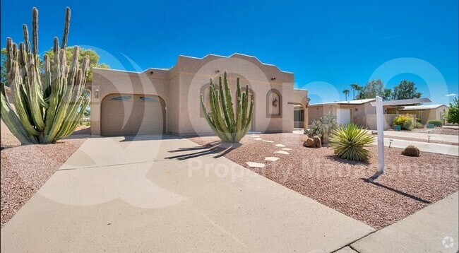 Building Photo - 8935 E Fairway Blvd Rental