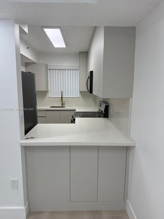 Photo - 7835 W 30th Ct Unit G-210