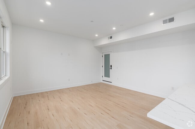 1BR, 1BA - 742SF - Living Room - The Firehouse Apartments