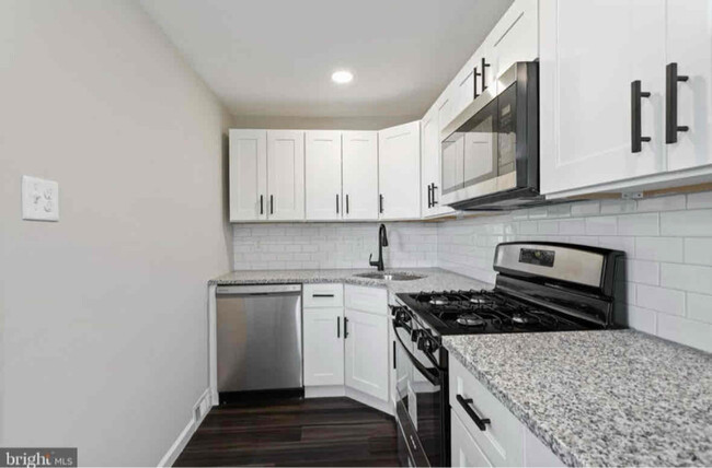 Photo - 247 W 21st St Townhome