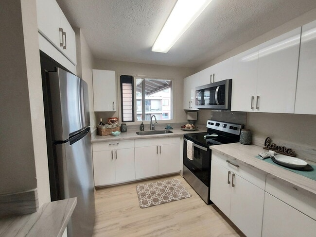 Building Photo - Renovated 2br/1ba/2pkg 3rd Fl Townhome Unit 312