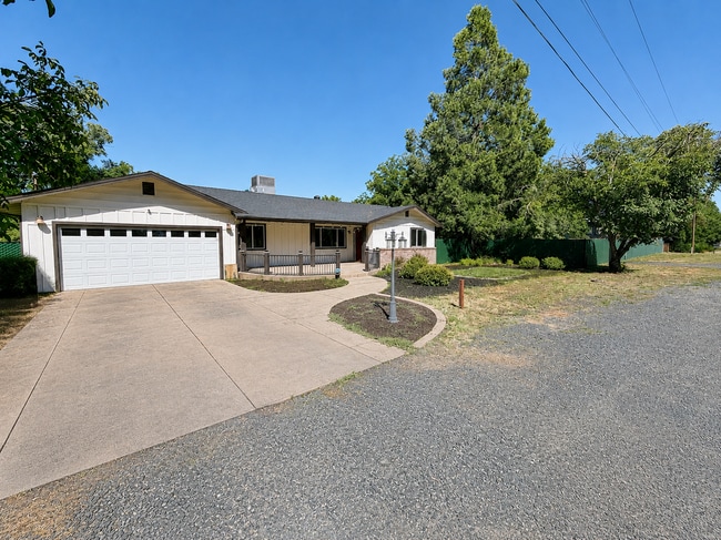 Photo - Private 3BR Home on Approx. 1 Acre | Huge Fenced Yard, Sunroom & 2-Car Garage