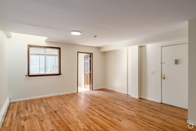 3BR, 1BA - 906SF - Living Room - 7005 67th Pl