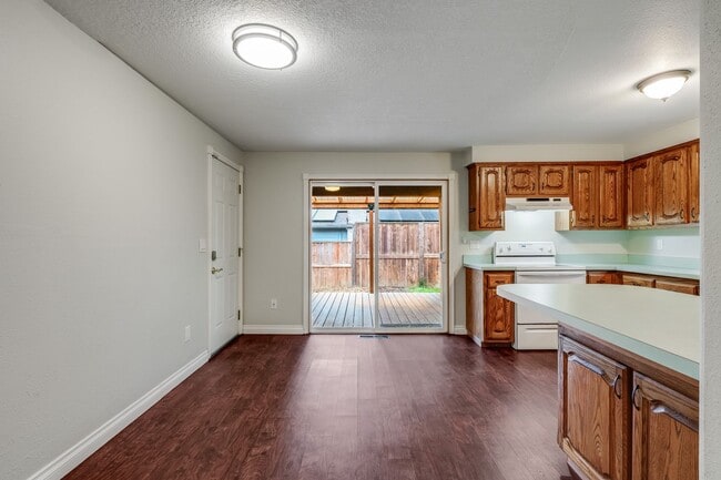 Photo - Expansive Backyard, Gardening Space & Comfortable Single-Level Living