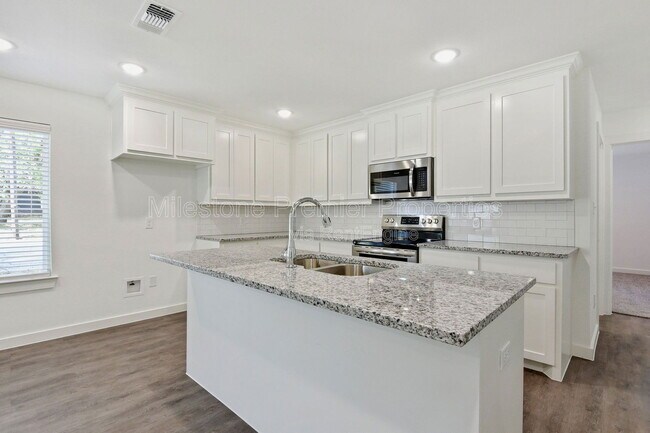 103 E Bond St