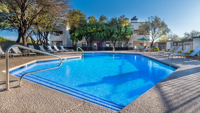 Length of pool with lounge chairs - Villas at Montebella Apartments