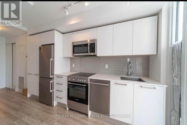 Photo - 28 Wellesley St E Unit 3001
