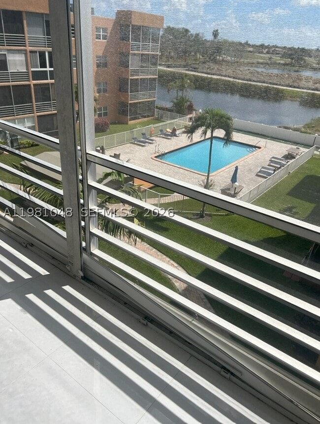 Building Photo - 3048 Sunrise Lakes Blvd Unit 411