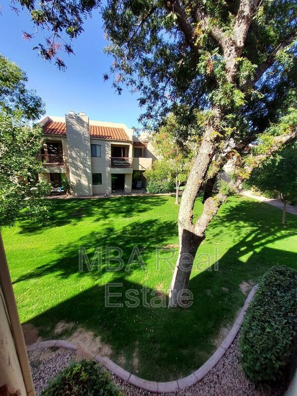 Building Photo - 9275 E Mission Ln Unit 203