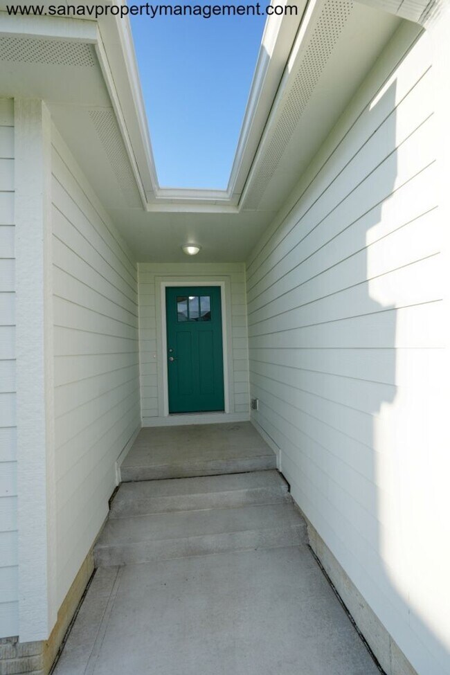 Photo - "Modern Comfort Meets Convenience: Your Ideal Home in Waukee"