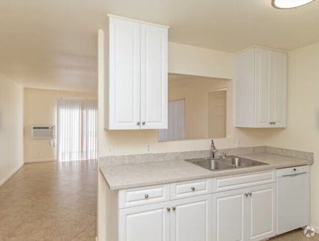 Building Photo - Welcome Home To Parkstone Vista! Unit 27