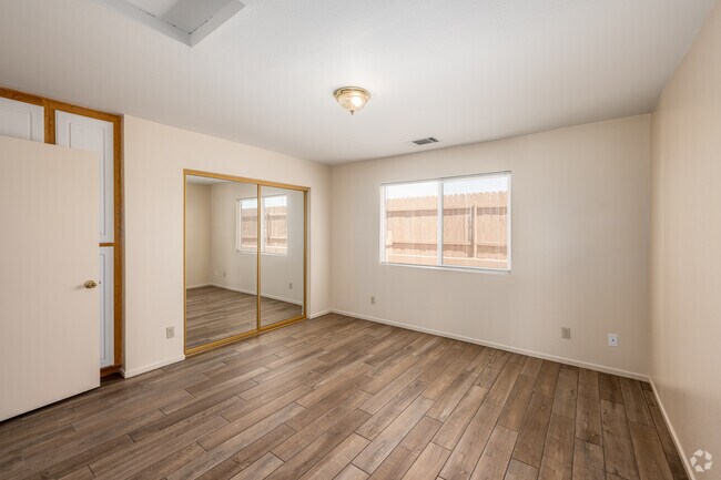 2BR, 1.5BA - 868SF - Primary Bedroom - Desert Breeze Apartments