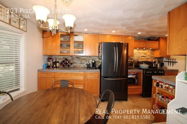 Photo - 203 Piscassic St