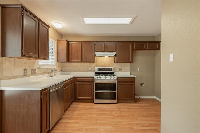 Photo - No Carpet! Tons of Space! Beautiful backya...