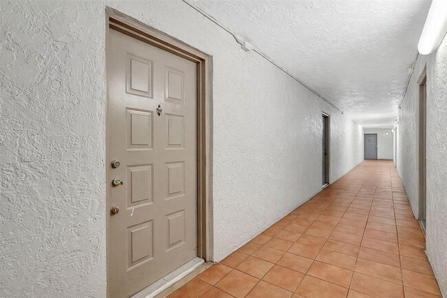 Photo - 711 N Pine Island Rd Unit #210