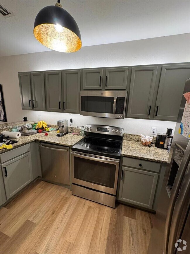 Building Photo - 8960 NW 97th Ave Unit 212 Rental