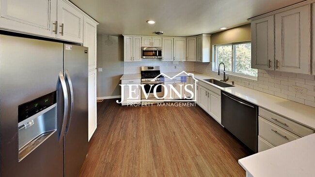 Photo - Near Randall Park - Charming home with two kitchens and washer/dryer included!