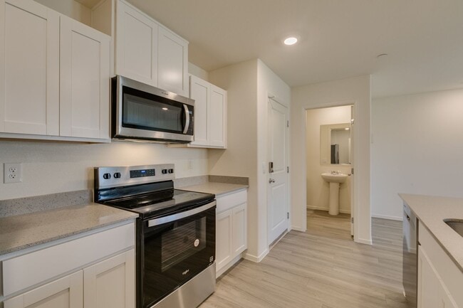 Photo - Gorgeous Townhome with upgrades in gated community* 3 large bedrooms, 2 car garage*Community pool...