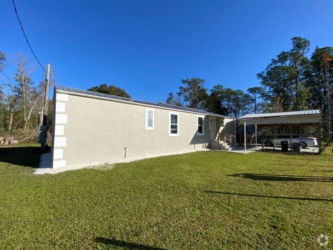 Building Photo - Remodeled 4 Bedroom, 2 Bathroom Manufactur... Rental