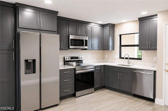 Building Photo - 16341 Dublin Cir Unit 105