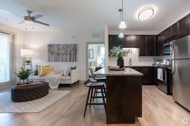 2BD, 2BA - 1,115SF - Kitchen and Living Room