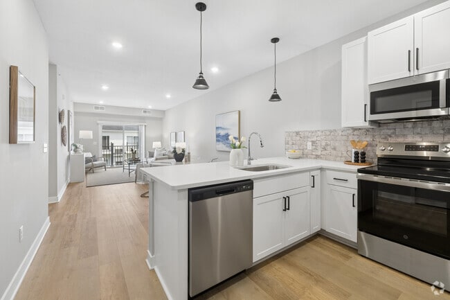 3BR, 2BA - 1,450SF - Kitchen, Dining Room and Living Room