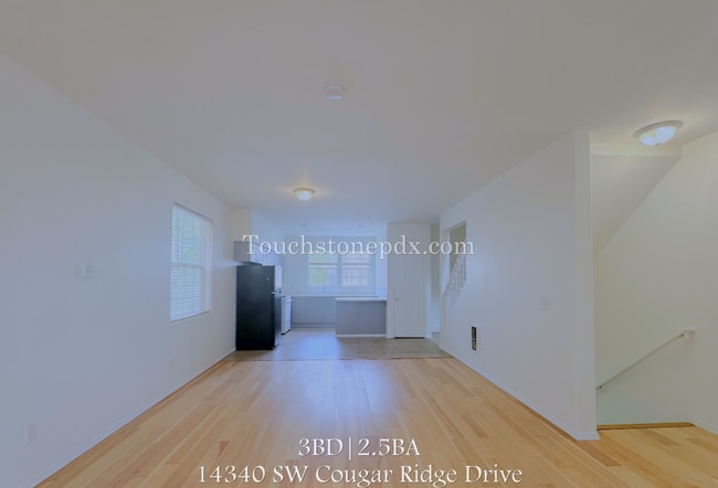 Building Photo - Light Filled 3 Bedroom Townhome with Deck, Attached Garage, and AC