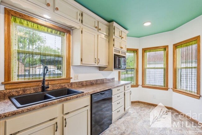 Photo - Amazing Tudor Home with Loads of Character!