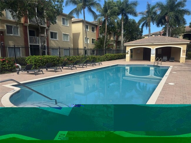 Building Photo - 7085 Nova Dr Unit 203