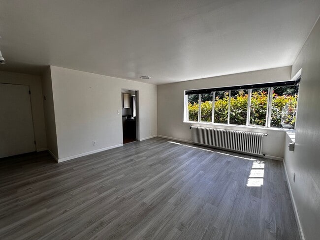Building Photo - Cute and Cozy East Queen Anne Condo with 2 Bedrooms, 1 Bath and 1 Covered Parking Space Unit 2