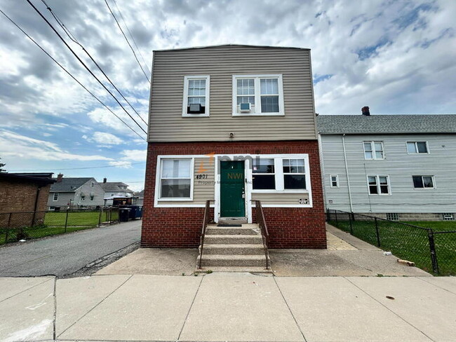 Building Photo - 4901 Walsh Ave Unit 1