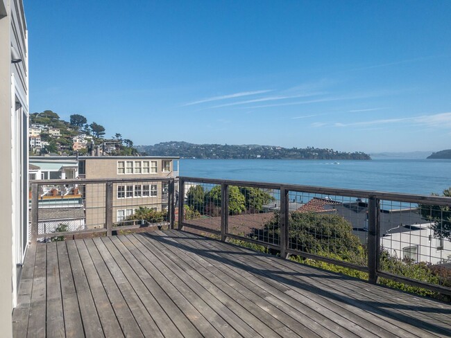 Photo - Stunning, Newly Remodeled, Top Floor Flat, Huge Private Deck,  Bay Views, Laundry! Parking! PROGR... Unit 10B