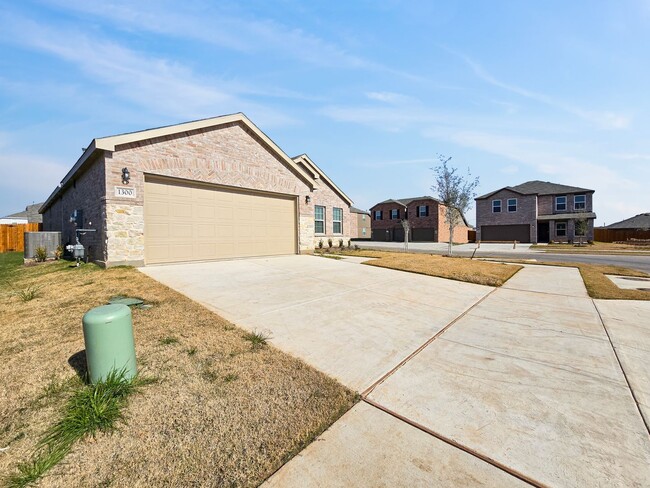 Photo - Brand New 4BR 3BA Home w/ Quartz Kitchen • 2-Car Garage • Fenced Yard in Elizabeth Creek