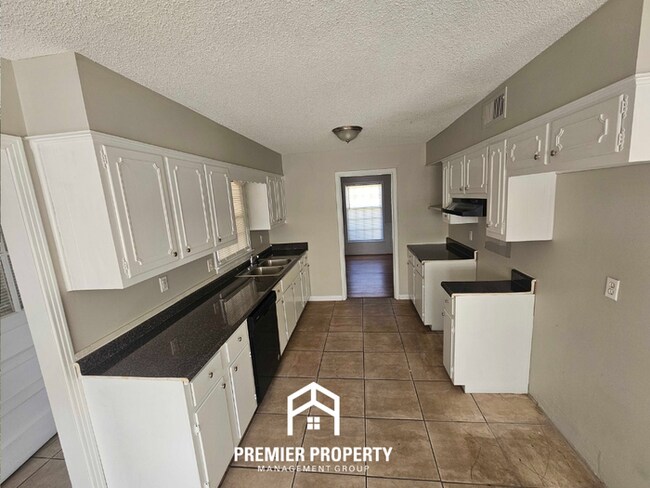 Photo - Classic 3BR/2BA Home in 38119 | Hardwood Floors, Fireplace & Formal Dining