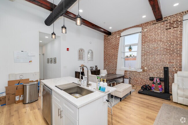 2BR, 2BA - 1,074SF - Kitchen Dining Room - The Nylon Lofts